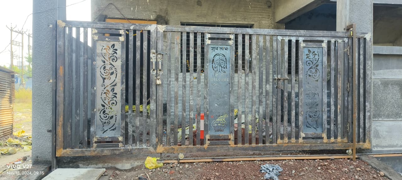Beautiful decorative iron gate with floral design by Heritage Fabrication Solapur
