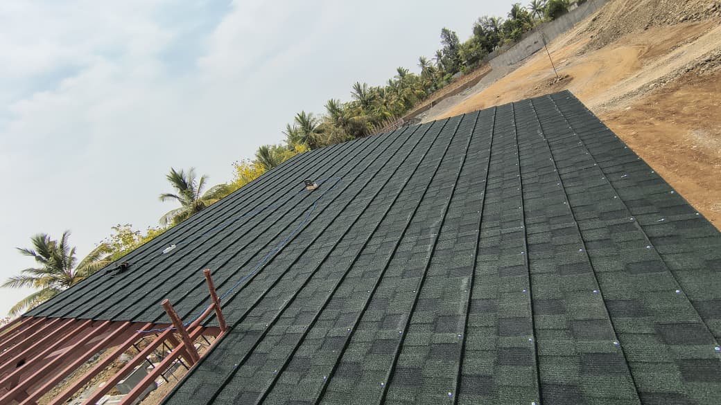 Roofing shingles installation by Heritage Fabrication Solapur