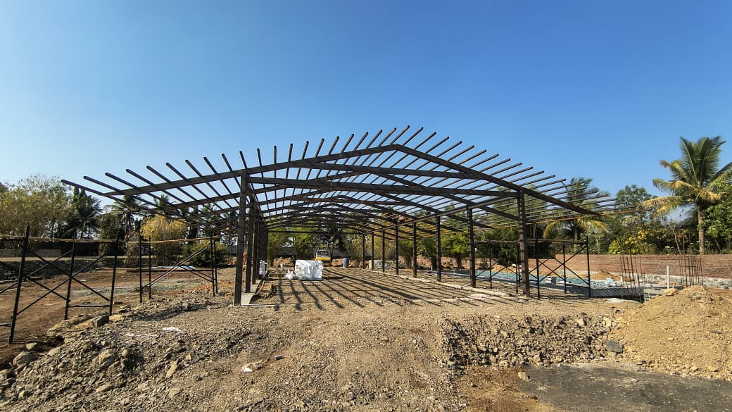 Multi-story steel building structure by Heritage Fabrication Solapur
